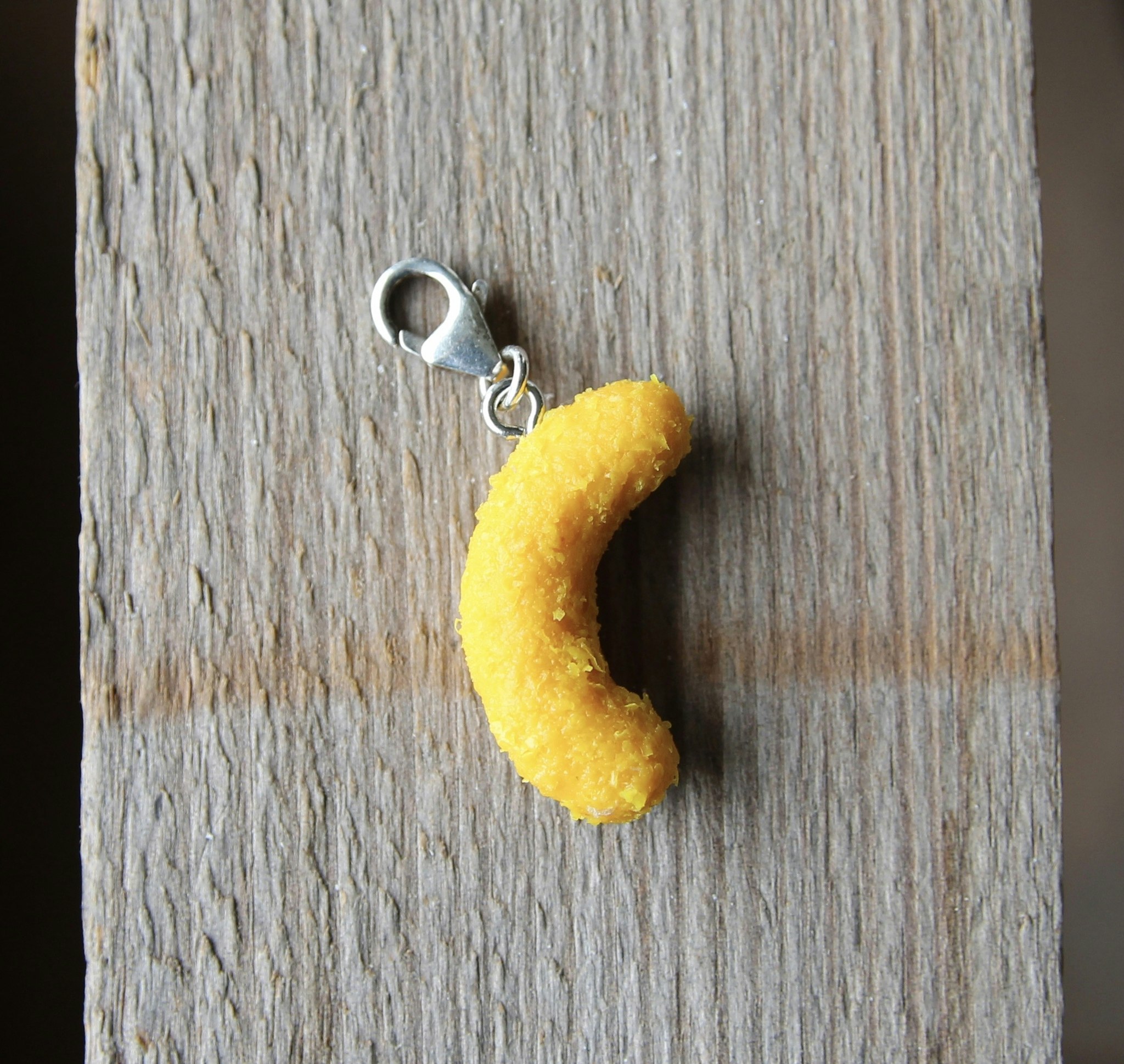 Necklace pendant, cheese doodle