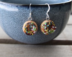Earrings, donuts with chocolate glaze and caramel sprinkles without a bite