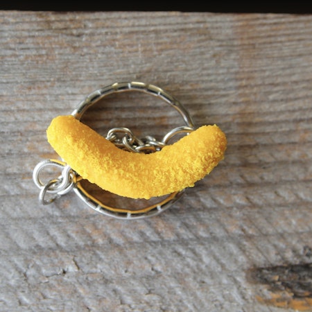 Keychain, cheese doodle