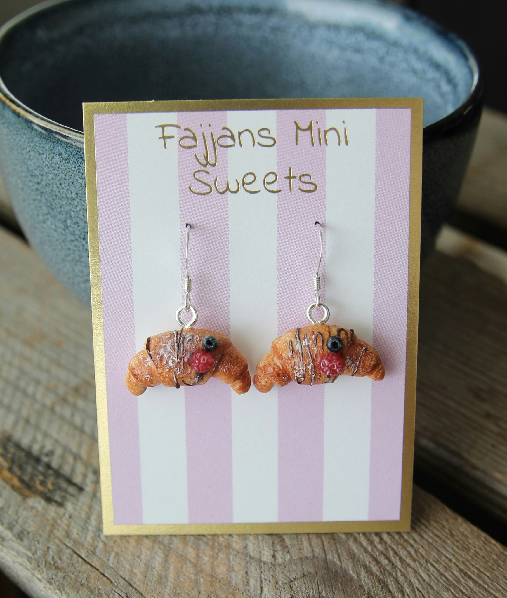 Earrings, chocolate croissants with berries