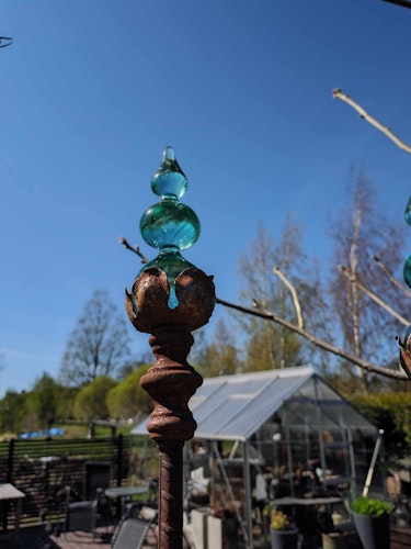 Blå spira av glas