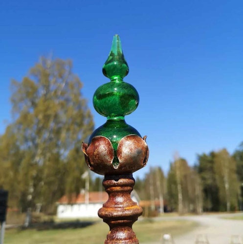 Grön spira av glas