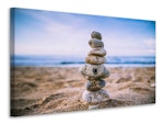 Ljuddämpande tavla - stone pile on the beach