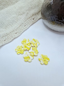 Gule blomster knapper