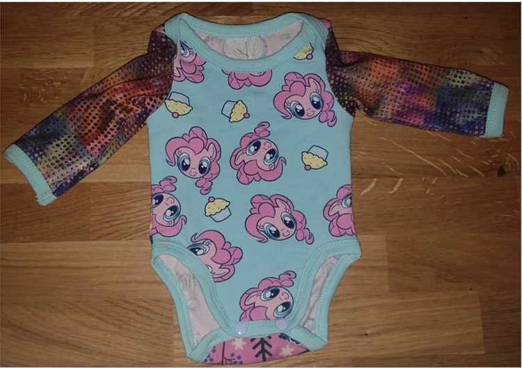 Body with pink pony faces and muffins size. 3 months (50)