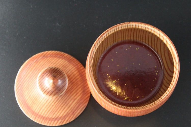 Storage jar with lid and red bottom