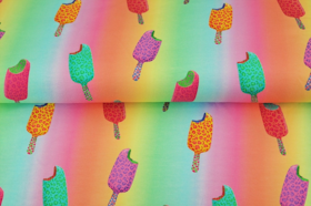 Leofläckiga glassar på regnbågsfärgad bakgrund