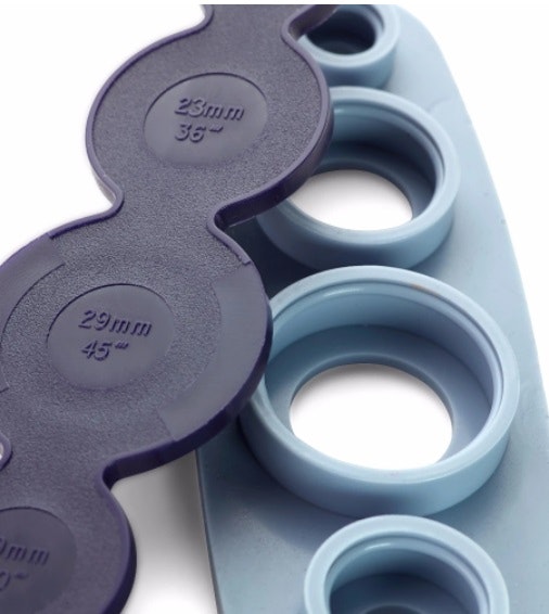 Prym tool for dressing buttons