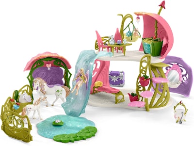 Schleich Glittrande blomhus med enhörningar sjö och stall