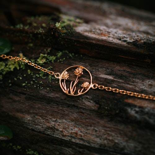 Brunkulla armband guld