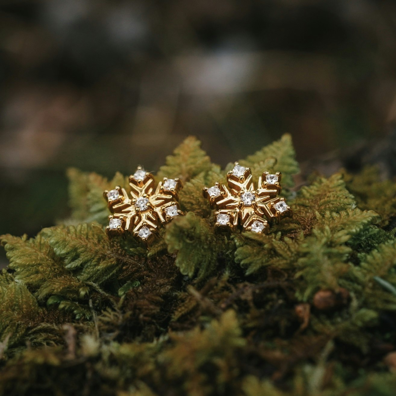 Snöflinga örhängen guld
