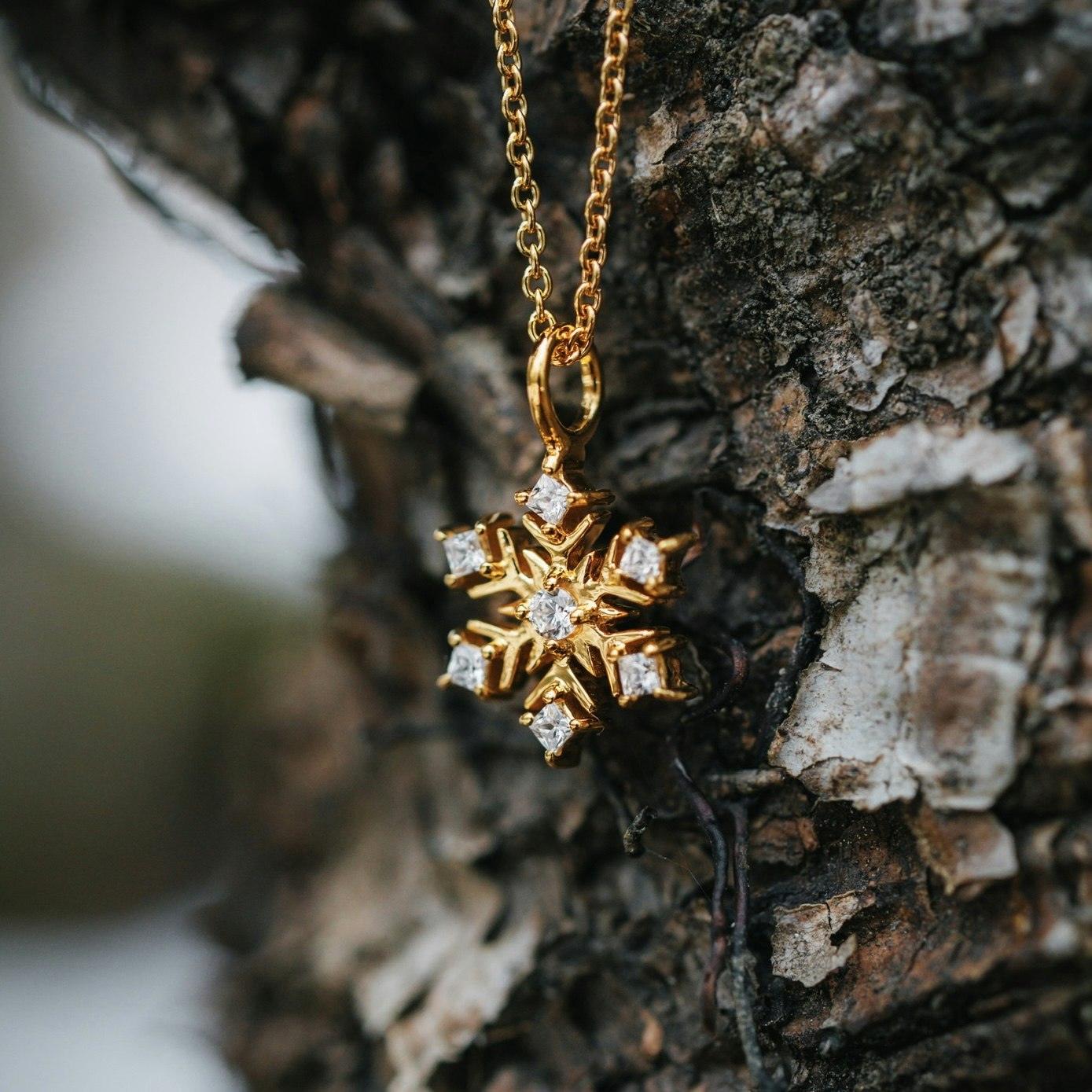 Snöflinga halsband guld