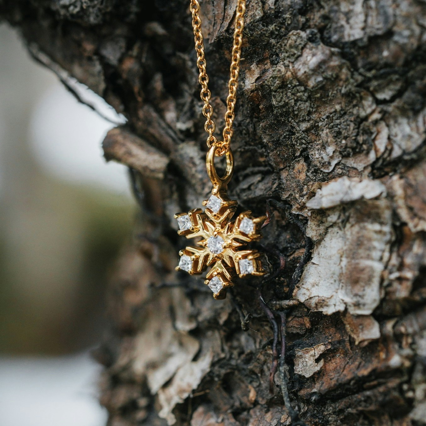 Snöflinga halsband guld
