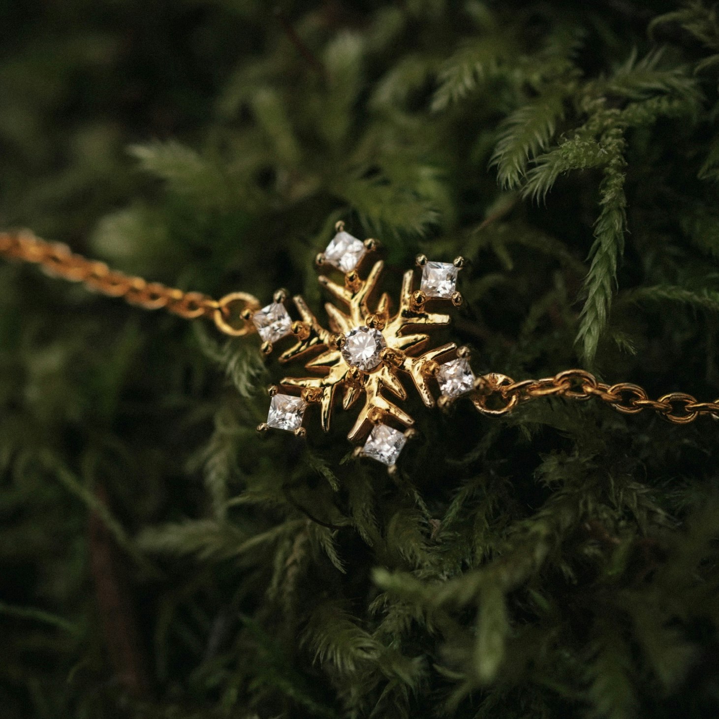 Snöflinga armband guld