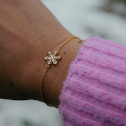 Snöflinga armband guld