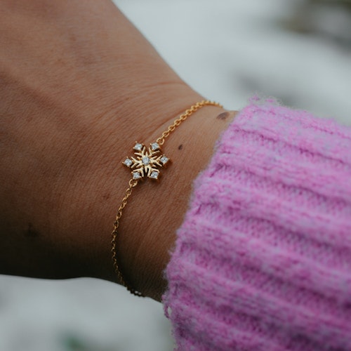 Snöflinga armband guld