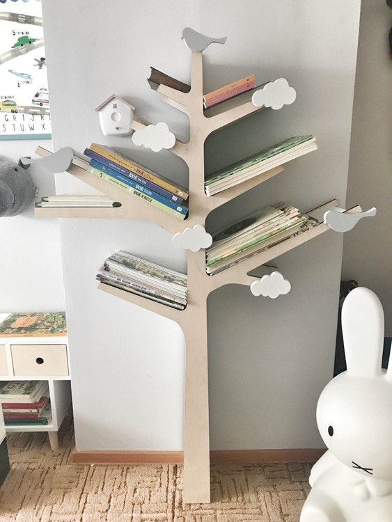 Bookshelf for the children's room in the shape of a beautiful tree 