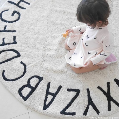 Lorena Canals round carpet for children's room, abc natural/black