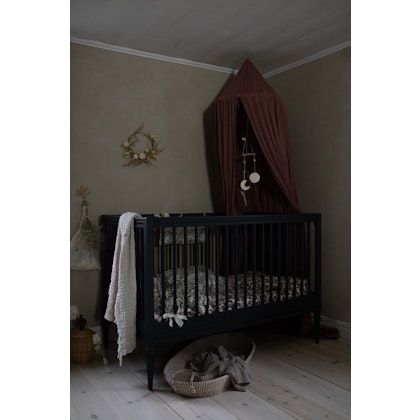 Antique cot with mattress for the children's room, green