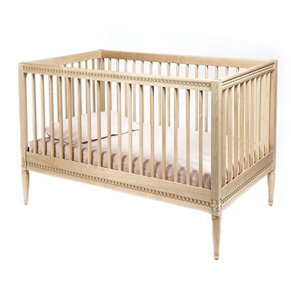 Antique cot with mattress for the children's room, natural