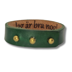 Armband, läder/grönt. Hemlig text "Jag är bra nog!" inuti