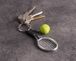 Nyckelring tennisboll och tennisracket