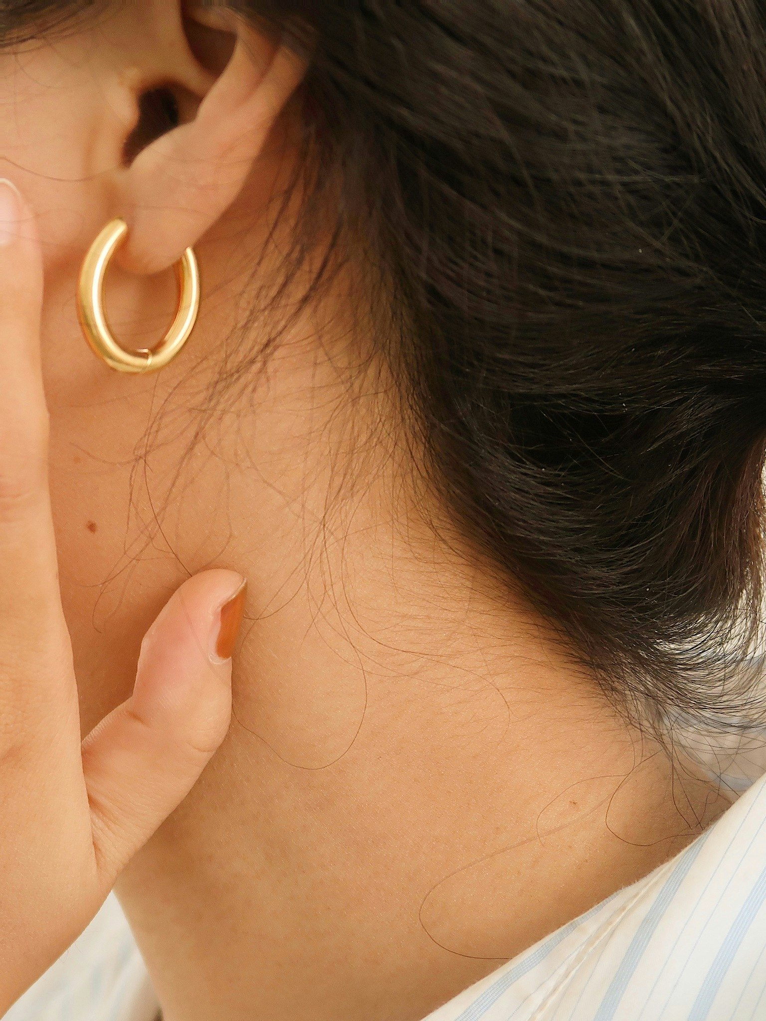 Ovala hoops i stål med 18K guld