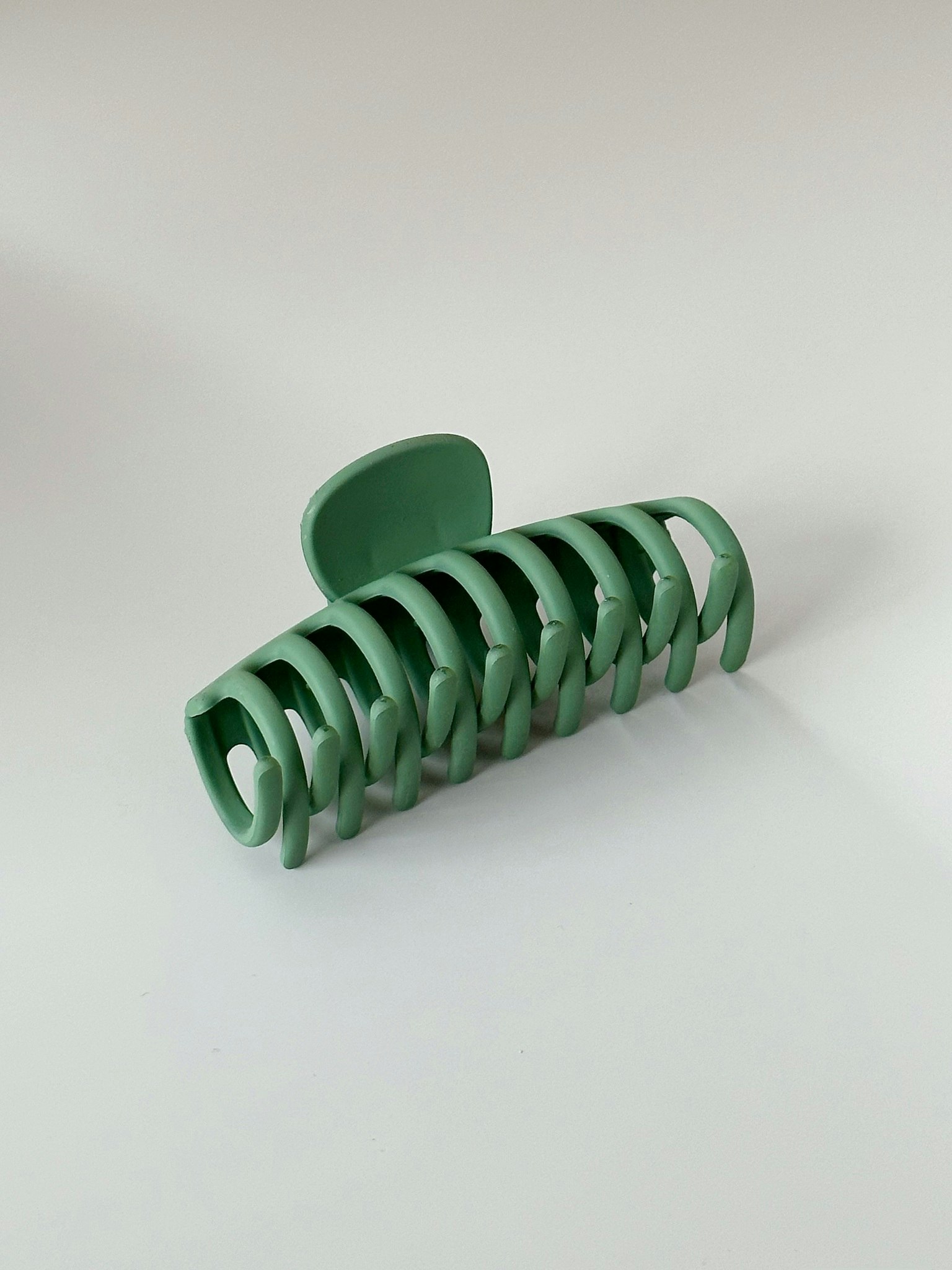 Ljusgrön hårklämma med avlång design