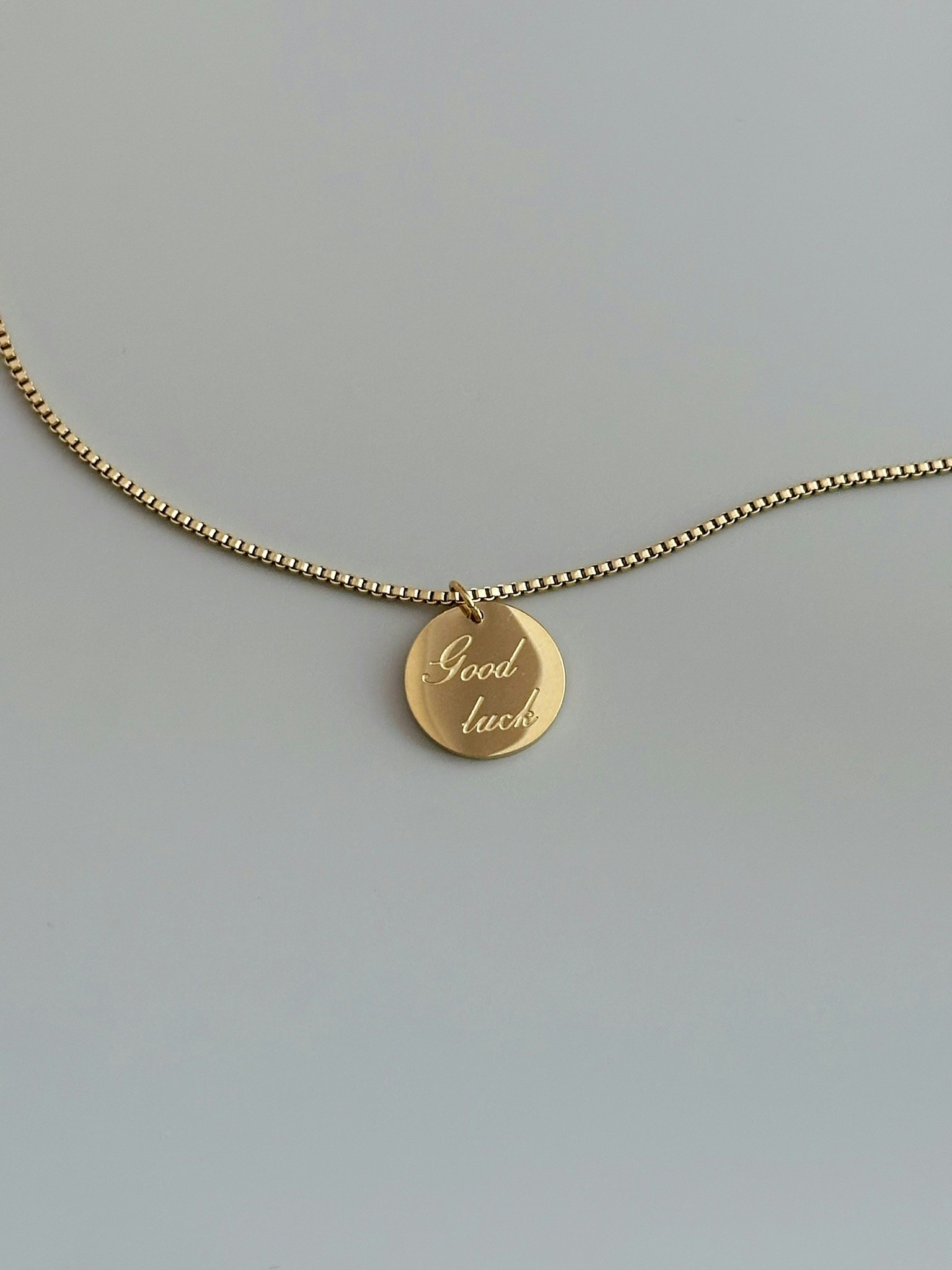 REA Halsband i stål med 18k guld med hängsmycke