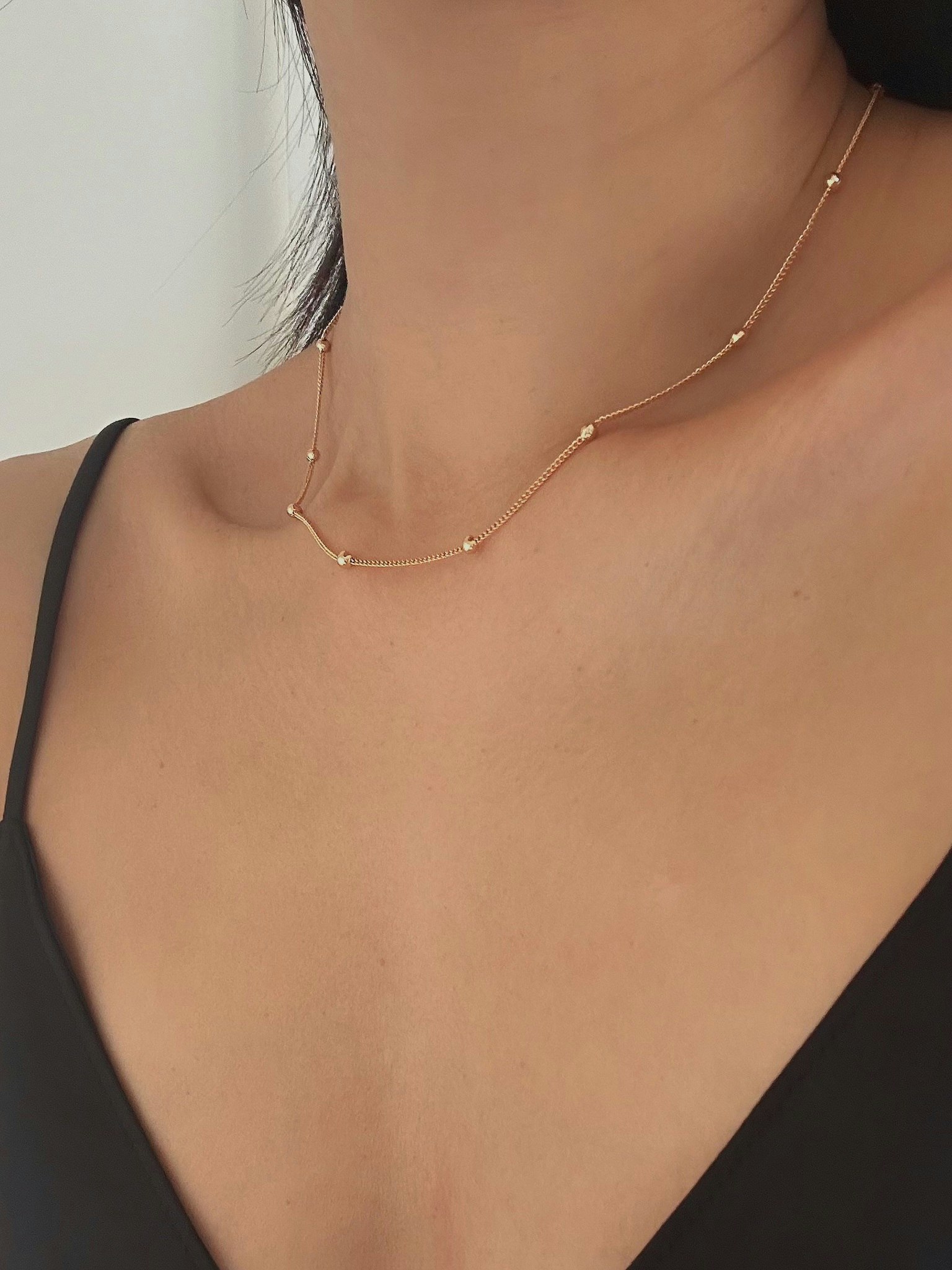 REA Guldfärgat halsband med kulkedja