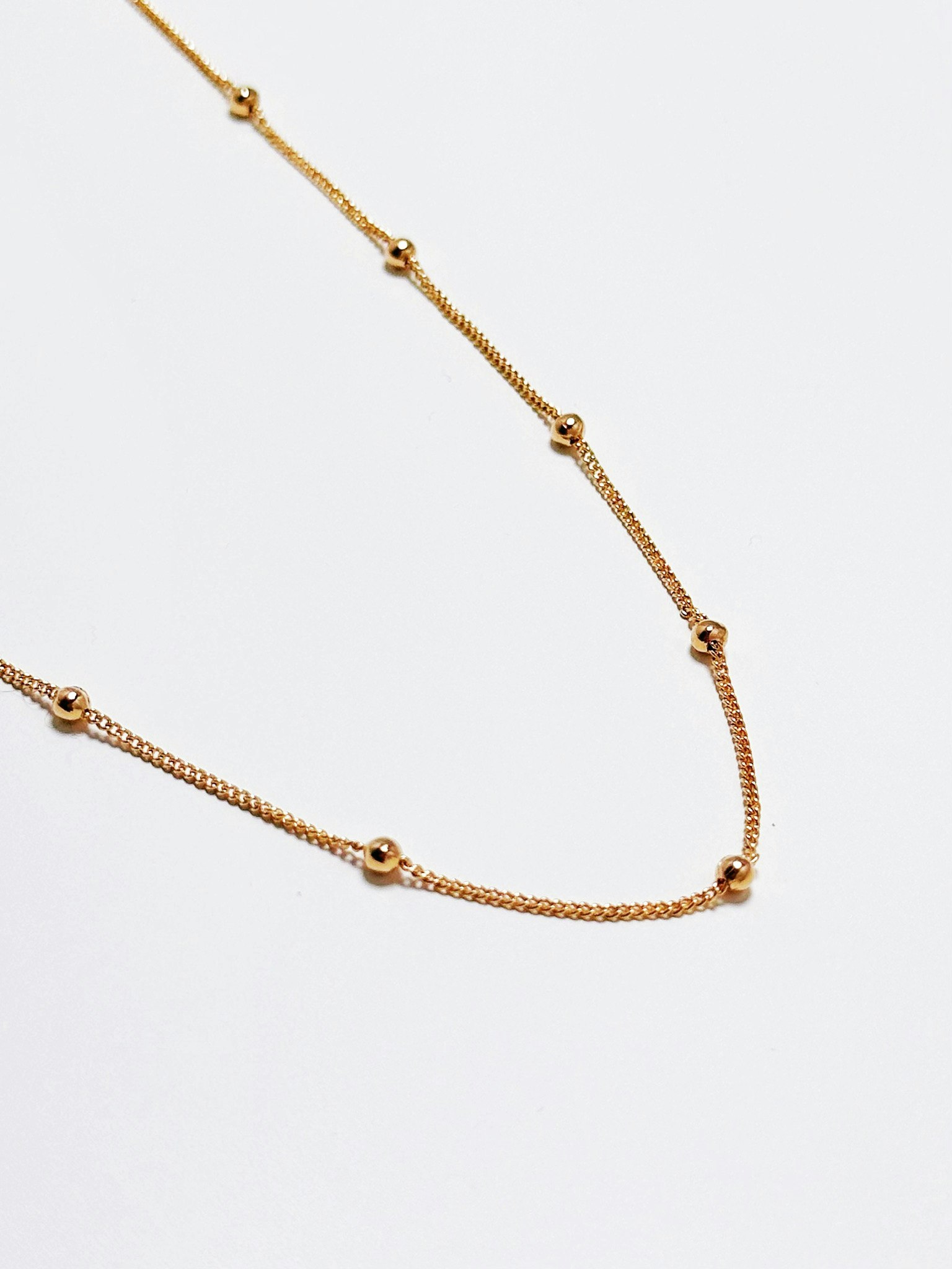 REA Guldfärgat halsband med kulkedja