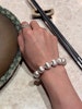 Armband med pärlor i metall