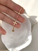 Halsband i stål med 18K guld med med liten fyrklöver i strass