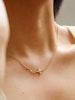 Halsband i stål med 18K guld med med liten fyrklöver i strass
