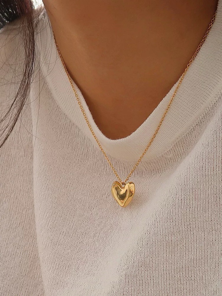 Halsband i stål med 18k guld med hjärta