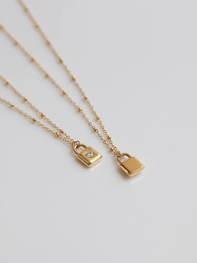 REA Halsband i stål med 18k guld med låsa och Cubic Zirconia