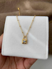 REA Halsband i stål med 18k guld med låsa och Cubic Zirconia