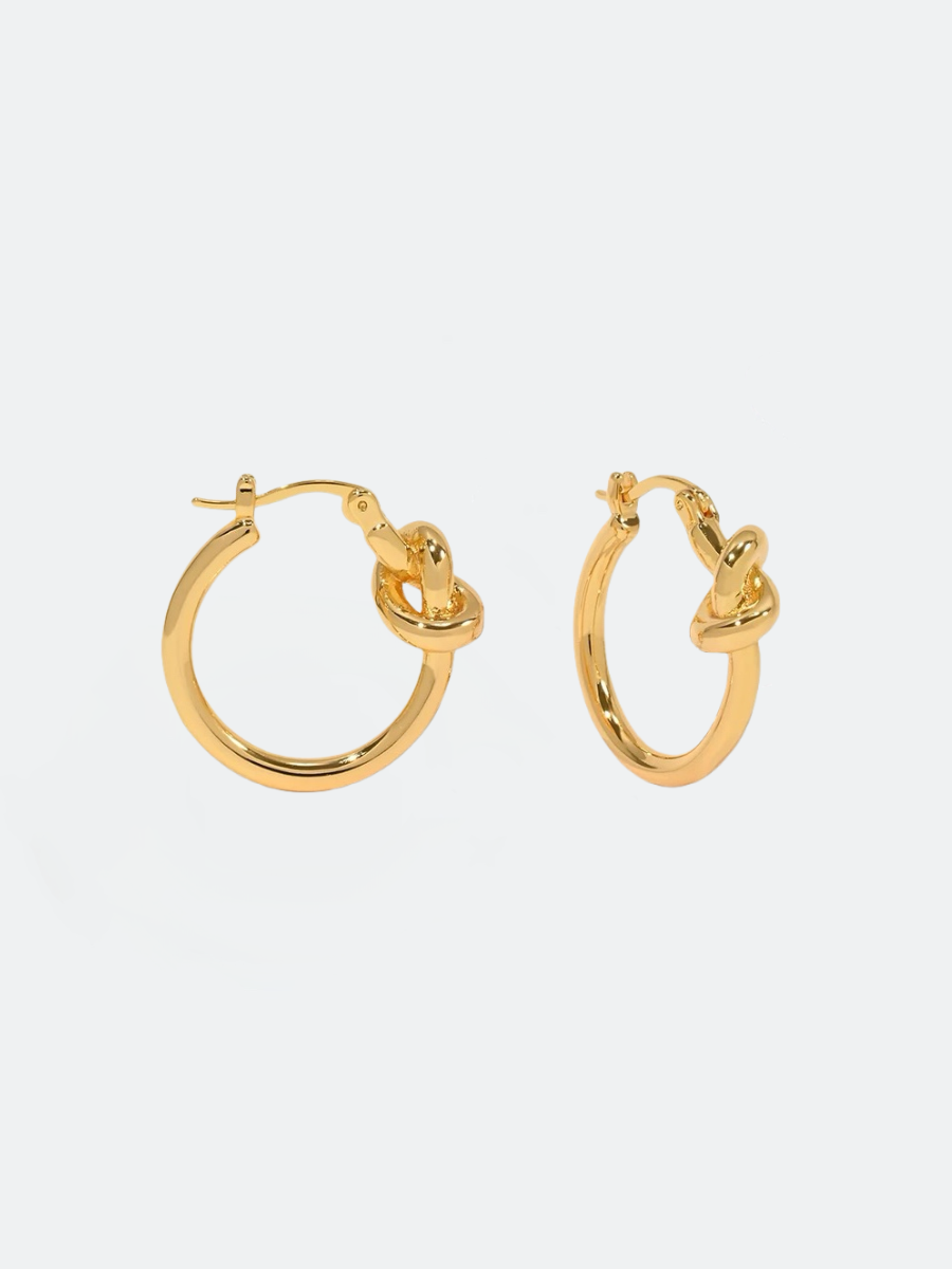 Hoops i stål med 18k guld och knut design