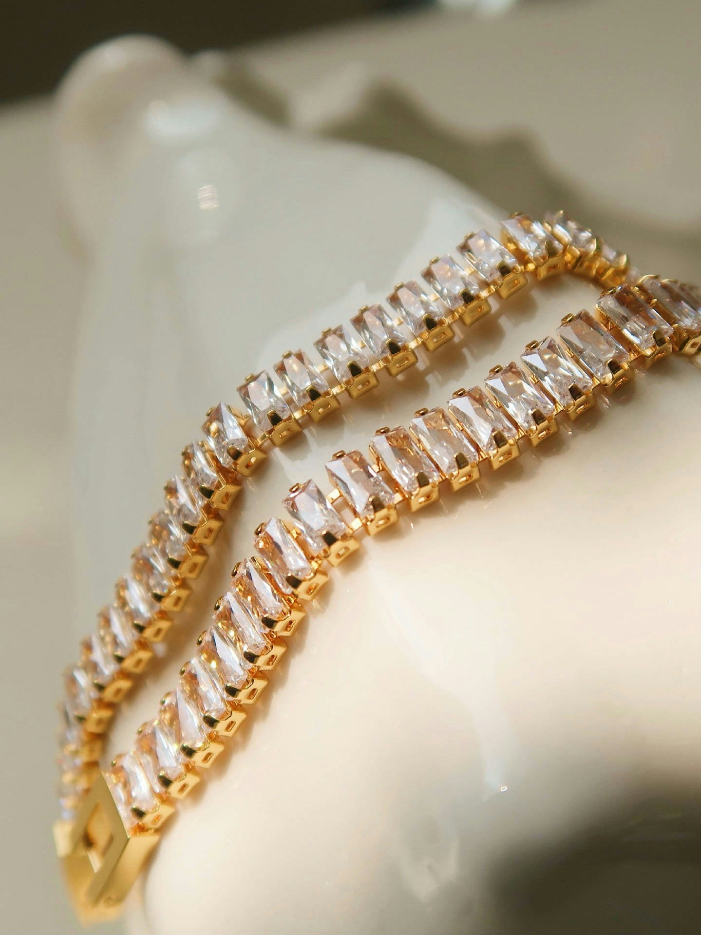 Tennis armband i stål med 18k guld med