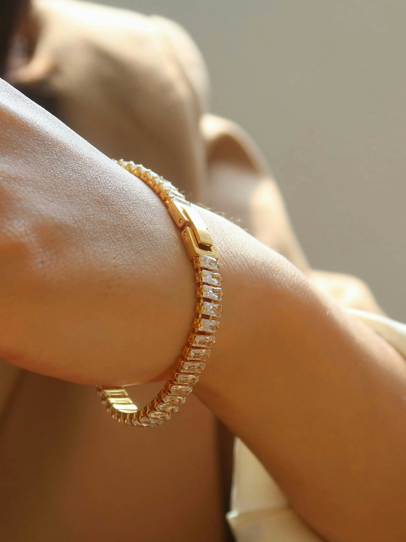 Tennis armband i stål med 18k guld med