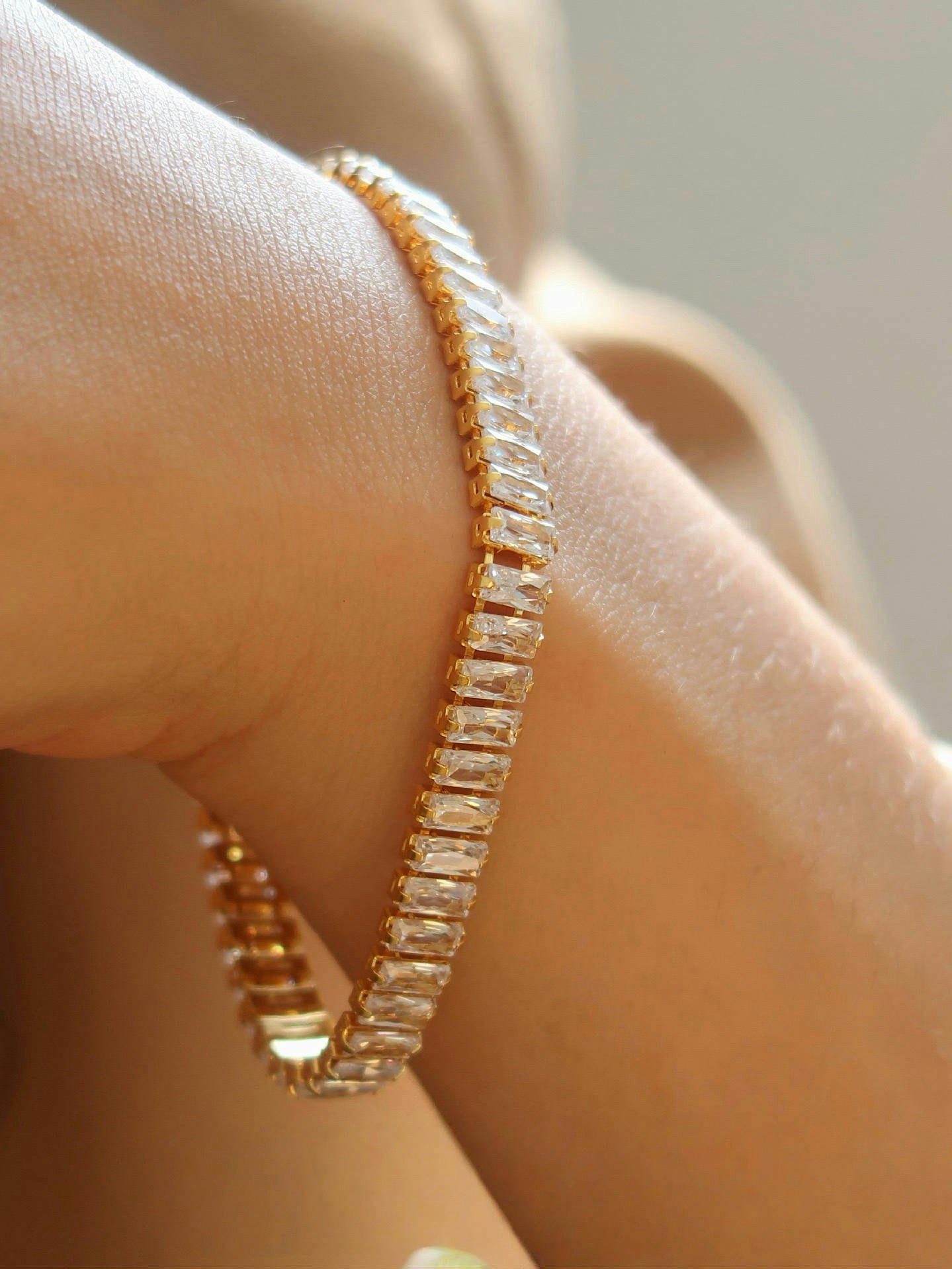 Tennis armband i stål med 18k guld med