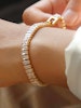 Tennis armband i stål med 18k guld med
