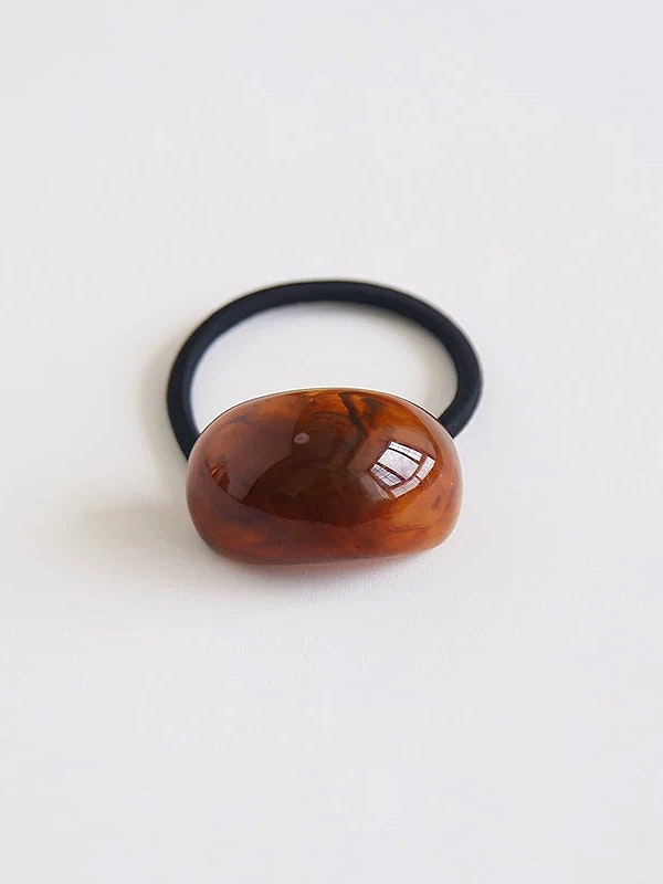 Hårsnodd med chunky oval dekoration