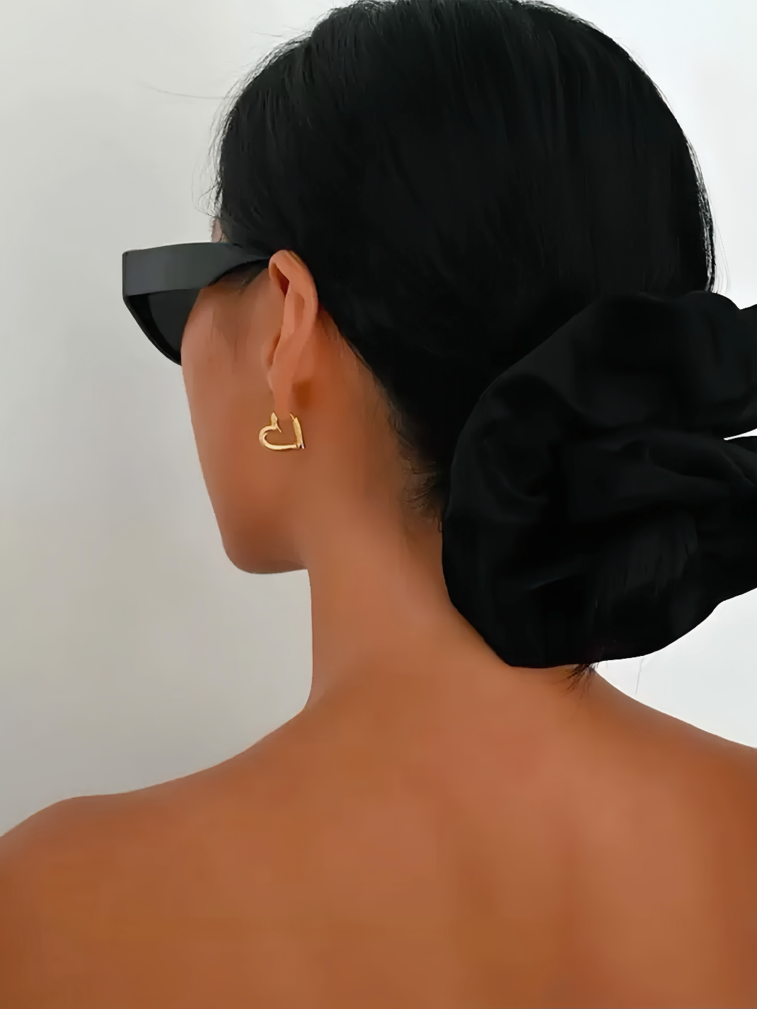 Hjärtformade hoops i stål med 18K guld