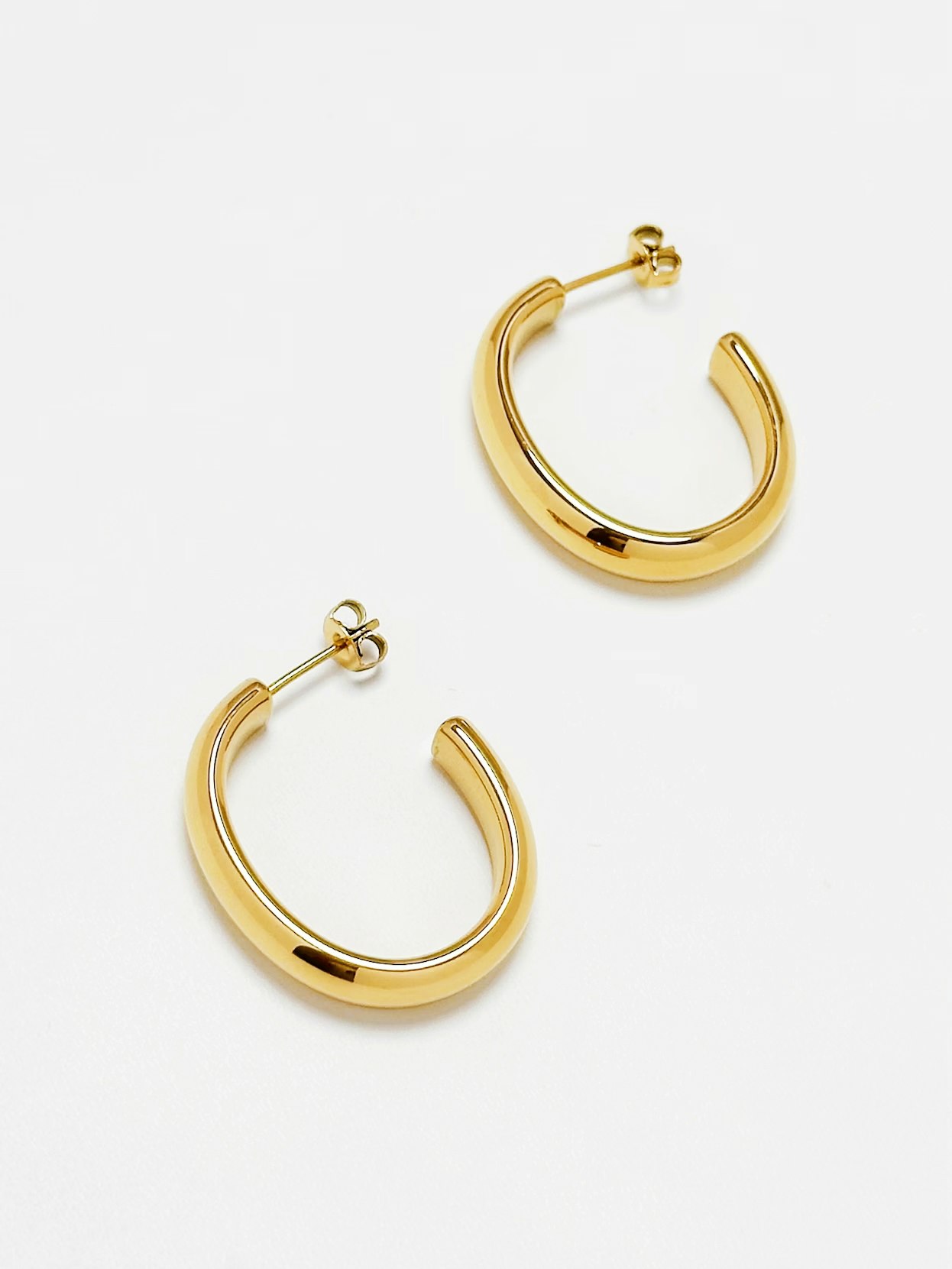 Hoops i stål med 18K guld och bred design