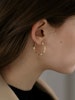 REA Guldfärgade hoops med vågig design