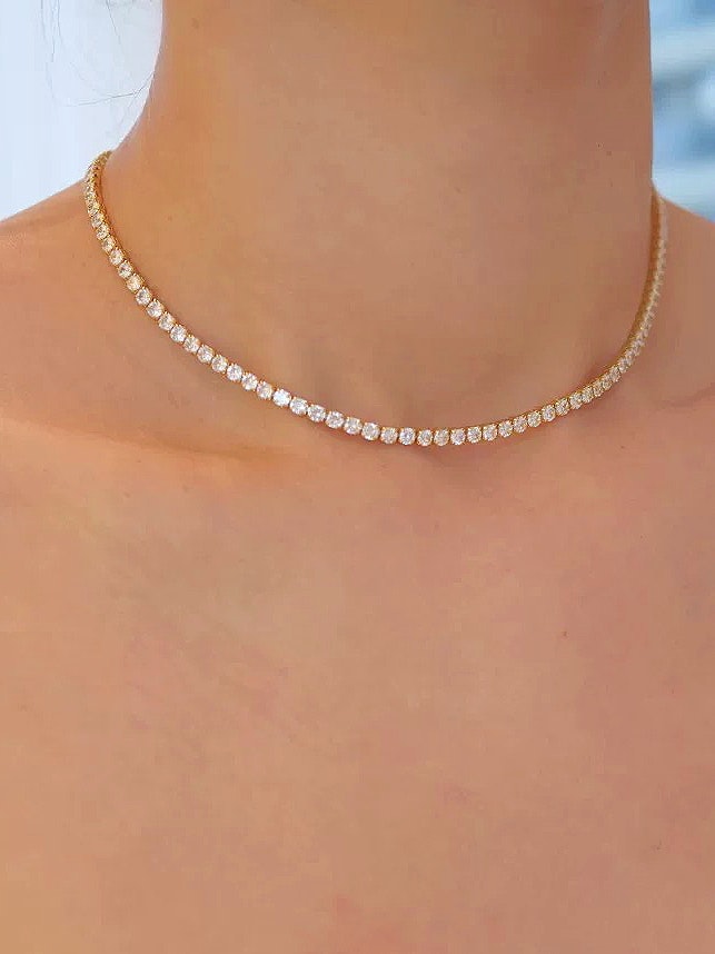 REA Guldfärgat tennishalsband med Cubic Zirconia
