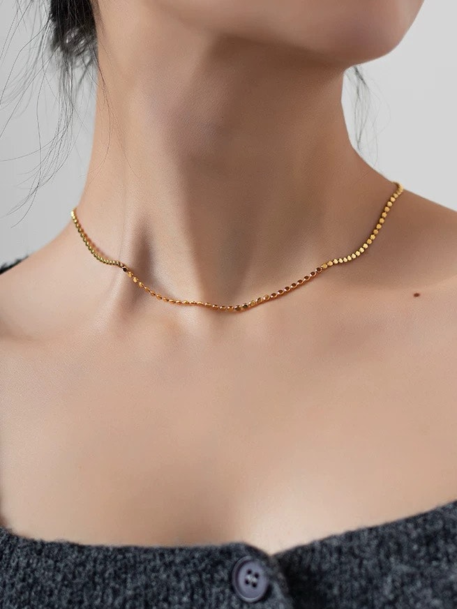 REA Guldfärgat halsband med kulkedja