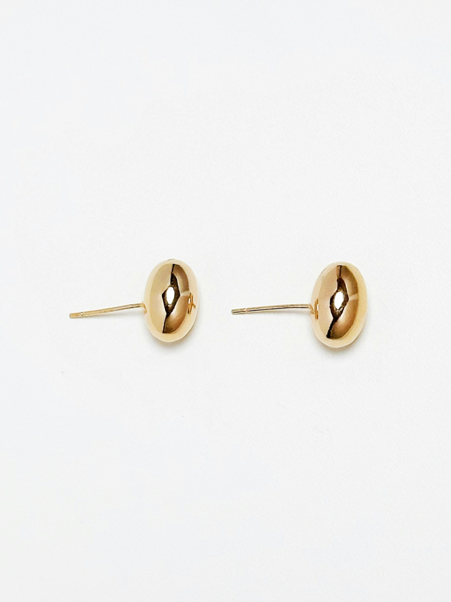 REA Guldfärgade ovalformade studs