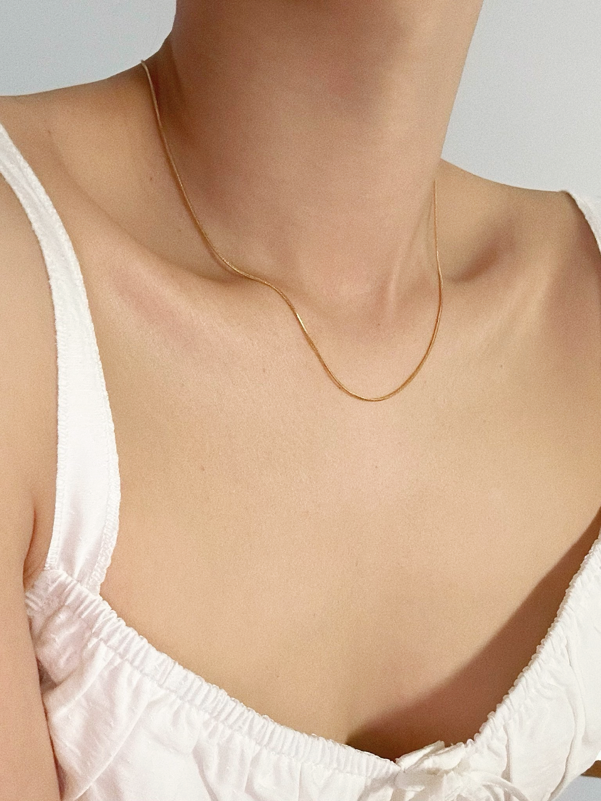Halsband i stål med 18k guld med ormkedja 1 mm